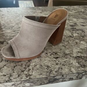 A pair of Frye Karissa Mule Suede sandals in size 6.5.